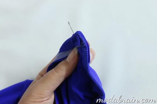 How to sew a stand-up collar into the neck of a bodysuit